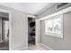 Small bedroom with closet and access to another room at 952 S Esperanza Ave, Mesa, AZ 85208
