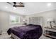 Serene bedroom with a queen-size bed and built-in dresser at 952 S Esperanza Ave, Mesa, AZ 85208