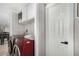Laundry room with washer, dryer, and overhead cabinets at 952 S Esperanza Ave, Mesa, AZ 85208