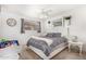 Bedroom with gray bedding and a white dresser at 1018 W Ivanhoe St, Chandler, AZ 85224