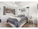 Bedroom with gray bedding and a white dresser at 1018 W Ivanhoe St, Chandler, AZ 85224