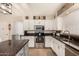 Modern kitchen with granite countertops and stainless steel appliances at 1018 W Ivanhoe St, Chandler, AZ 85224