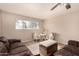 Relaxing living area featuring comfy seating and a rustic wooden crate at 1018 W Ivanhoe St, Chandler, AZ 85224