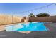 Refreshing kidney-shaped pool surrounded by a private backyard at 1018 W Ivanhoe St, Chandler, AZ 85224