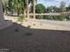 Landscaped path alongside a lake in a community setting at 11042 N 28Th Dr # 136, Phoenix, AZ 85029