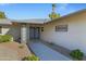 House exterior with walkway leading to double front doors at 12424 W Bluestem Dr, Sun City West, AZ 85375