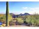 Scenic view of mountains and a home from a distance at 12887 N 135 St, Scottsdale, AZ 85259