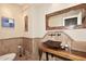 Elegant bathroom with unique vessel sink and rustic wood vanity at 12887 N 135 St, Scottsdale, AZ 85259