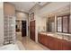 Elegant bathroom with granite countertops and glass block shower at 12887 N 135 St, Scottsdale, AZ 85259