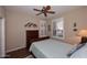 Bright bedroom with light-blue bedding and wood dresser at 12887 N 135 St, Scottsdale, AZ 85259