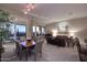 Open concept dining area with living room view at 12887 N 135 St, Scottsdale, AZ 85259