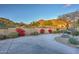 Landscaped front yard with desert plants and mountain backdrop at 12887 N 135 St, Scottsdale, AZ 85259