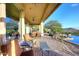 Covered patio with seating and outdoor grill, mountain views at 12887 N 135 St, Scottsdale, AZ 85259