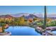 Stunning infinity pool with mountain views at 12887 N 135 St, Scottsdale, AZ 85259