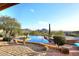 Stunning pool and spa with mountain views and desert landscaping at 12887 N 135 St, Scottsdale, AZ 85259