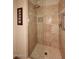 Walk-in shower with glass enclosure and neutral tile at 12887 N 135 St, Scottsdale, AZ 85259