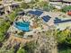 Aerial view of house with pool and solar panels at 12950 N 119Th St, Scottsdale, AZ 85259