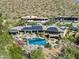 Aerial view of house with pool and solar panels at 12950 N 119Th St, Scottsdale, AZ 85259