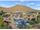 Luxury home with solar panels, pool, and mountain views at 12950 N 119Th St, Scottsdale, AZ 85259