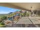 Covered balcony overlooking the pool and mountain views at 12950 N 119Th St, Scottsdale, AZ 85259