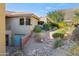 Landscaped yard with native plants and a rock pathway at 12950 N 119Th St, Scottsdale, AZ 85259