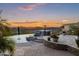 Expansive pool and patio area with sunset views at 12950 N 119Th St, Scottsdale, AZ 85259