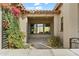 A charming courtyard with lush greenery and a stone pathway at 13222 E Ranch Gate Rd, Scottsdale, AZ 85255