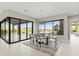 Bright dining room with a view of the backyard and pool at 13222 E Ranch Gate Rd, Scottsdale, AZ 85255