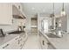 Kitchen with stainless steel appliances and light wood cabinets at 13222 E Ranch Gate Rd, Scottsdale, AZ 85255