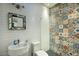 Stylish bathroom with unique tile and floating sink at 1325 W Lynwood St, Phoenix, AZ 85007