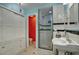 Classic bathroom with subway tile, pedestal sink, and a walk-in shower at 1325 W Lynwood St, Phoenix, AZ 85007