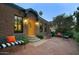 Inviting front patio with brick pavers and seating area at 1325 W Lynwood St, Phoenix, AZ 85007