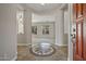 Elegant entryway with tiled floor and decorative inlay at 13813 W Monterey Way, Avondale, AZ 85392