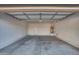 Attached garage with extra storage space at 13813 W Monterey Way, Avondale, AZ 85392