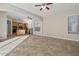 Kitchen with an island, wood cabinets, and tile flooring at 13813 W Monterey Way, Avondale, AZ 85392