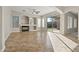 Living room with tile floors, fireplace and access to the backyard at 13813 W Monterey Way, Avondale, AZ 85392