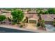 Single-story home with two-car garage and nicely landscaped yard at 13827 W Junipero Dr, Sun City West, AZ 85375