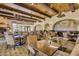 Community dining area with a fireplace and plenty of seating at 13827 W Junipero Dr, Sun City West, AZ 85375