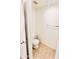 Small half bathroom with toilet and sink at 1421 N 80Th Ln, Phoenix, AZ 85043