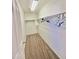 Large walk-in closet with ample hanging space at 1421 N 80Th Ln, Phoenix, AZ 85043