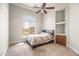 Bright bedroom with a built-in shelving unit at 14216 S Canyon Dr, Phoenix, AZ 85048