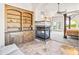 Main bedroom with fireplace and built-in shelving at 14216 S Canyon Dr, Phoenix, AZ 85048