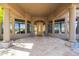 Bright and spacious entryway with large windows, a double door, and a stone floor at 14216 S Canyon Dr, Phoenix, AZ 85048