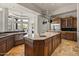 Gourmet kitchen featuring granite counters and wooden cabinetry at 14216 S Canyon Dr, Phoenix, AZ 85048