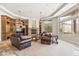 Bright living room with built-ins, fireplace, and views at 14216 S Canyon Dr, Phoenix, AZ 85048