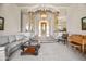 Spacious living room with a view of the entryway and piano at 14216 S Canyon Dr, Phoenix, AZ 85048