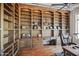 Large home office with extensive built-in shelving at 14216 S Canyon Dr, Phoenix, AZ 85048