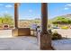 Built-in outdoor kitchen with mountain views at 14216 S Canyon Dr, Phoenix, AZ 85048