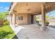 Spacious covered patio with seating area and beautiful views of the desert landscape at 14216 S Canyon Dr, Phoenix, AZ 85048