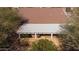 Aerial view of backyard with pergola and desert landscaping at 14731 W Trading Post Dr, Sun City West, AZ 85375